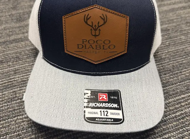 Grey and navy mesh Poco Diablo hat with hexagon leather patch