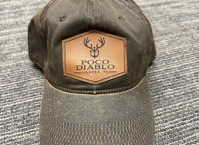 Brown rugged blend hat with hexagon leather patch